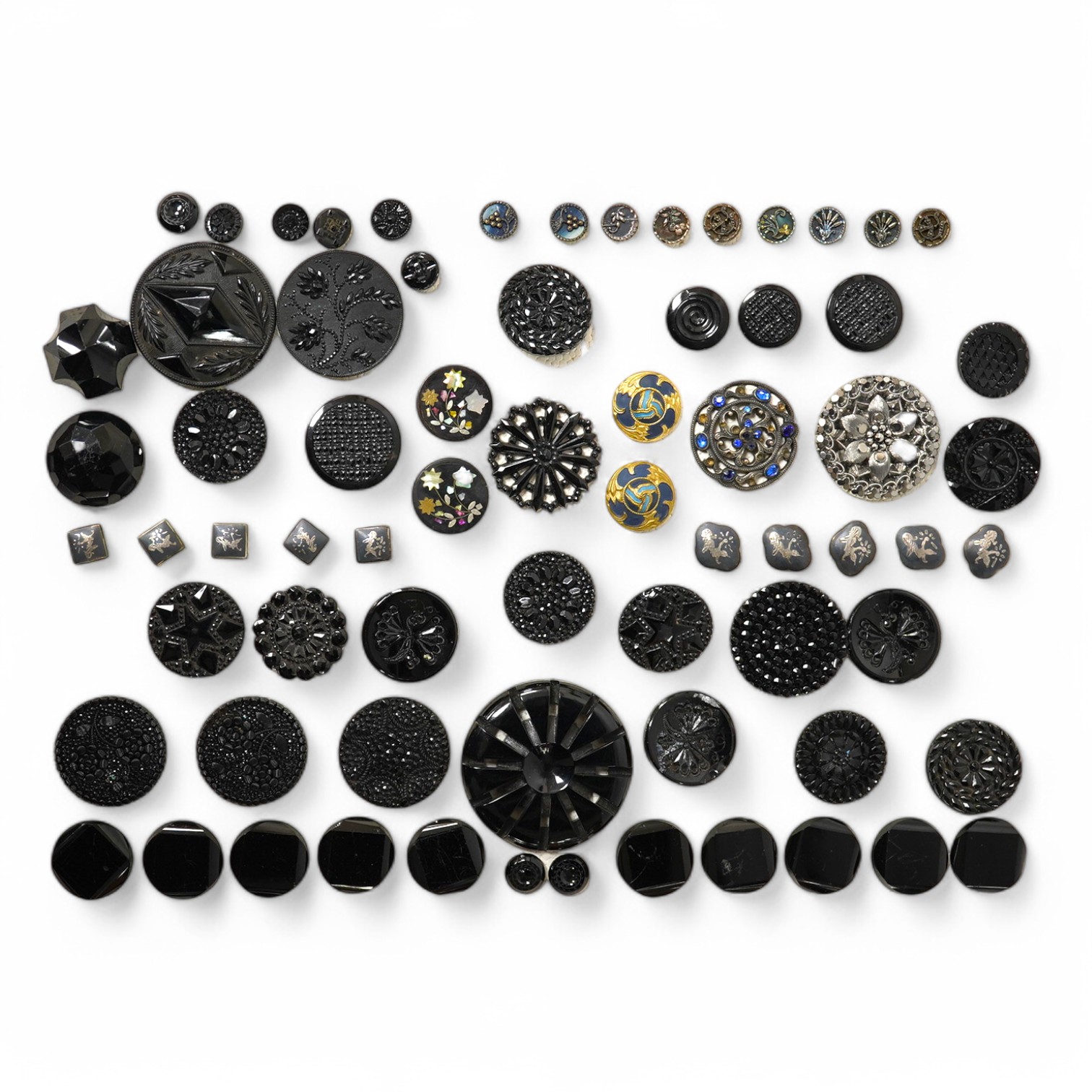 A collection of assorted Victorian and later jet, simulated jet and other decorative buttons, largest 50mm. Condition - good